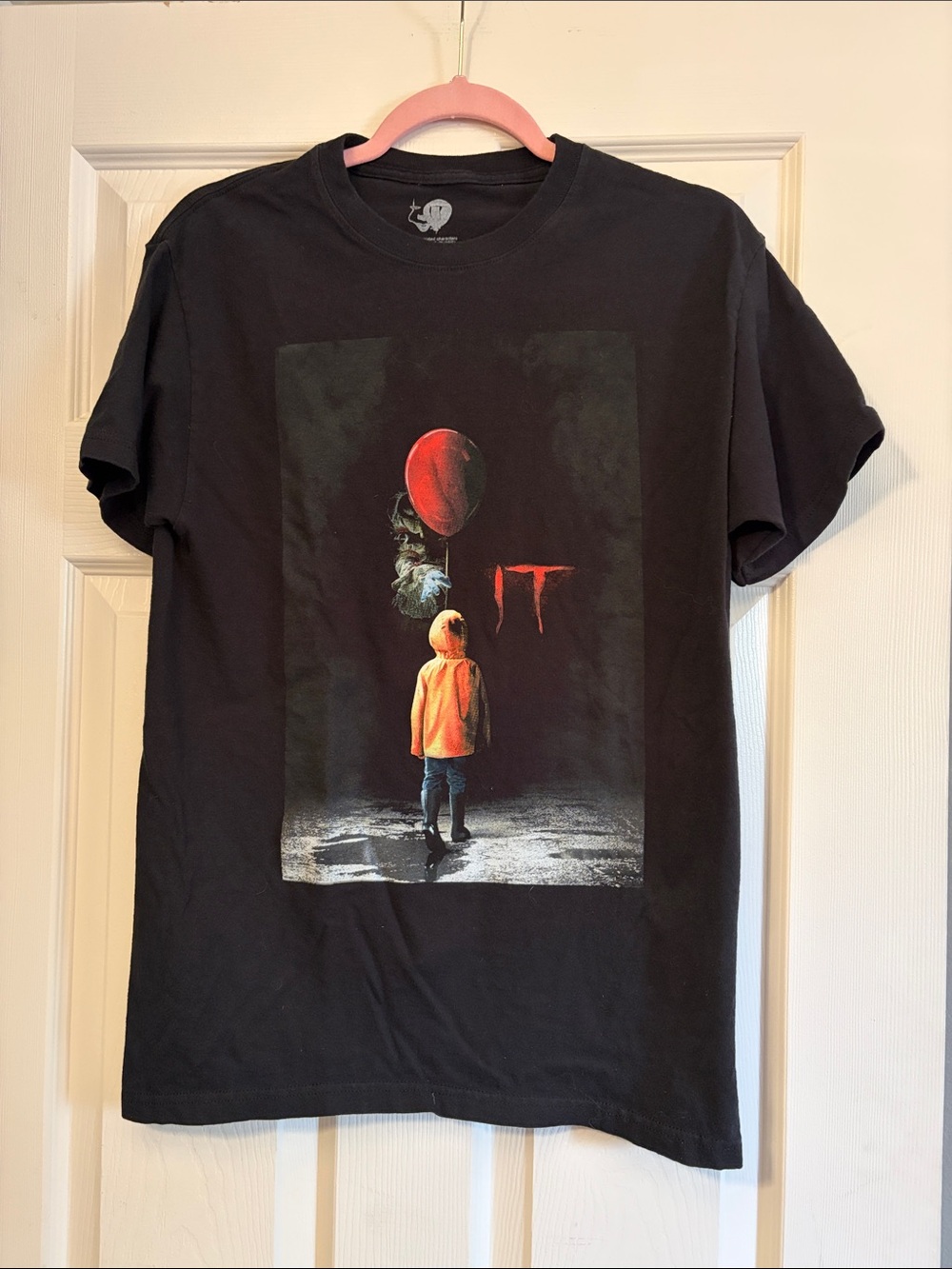 Black Short-Sleeve Graphic Tee with Orange Accent